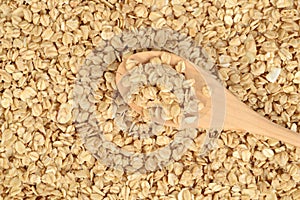 Granola background with wood spoon