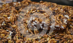Granola bar in a bowl for sale. Healthy sweet dessert snack. Cereal granola bar with nuts, fr