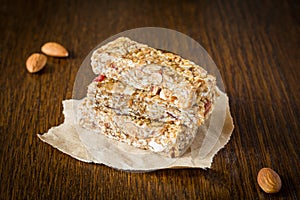 Granola bar or energy bar on brown background