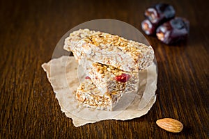 Granola bar or energy bar on brown background