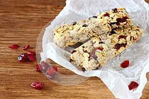 Granola bar or energy bar on wooden background