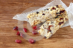 Granola bar or energy bar on wooden background