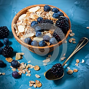 Granola with blueberries and blackberries. Healthy food.