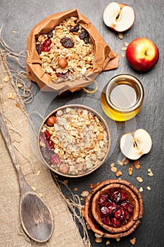 Granola, dried berries, nuts, apples and honey.