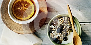 Granola Lemon Tea Morning Meal Breakfast Muesli Concept photo