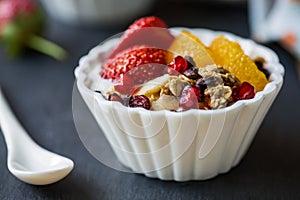 Granola with Orange,Strawberry on yogurt