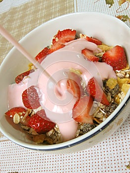 Granola, strawberries and yogurt