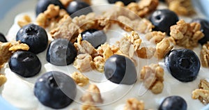 Granola with yogurt and blueberries.