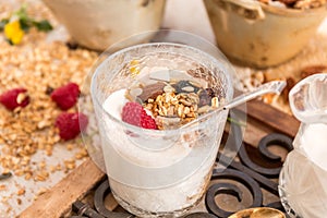 Granola, yogurt, nuts and berries