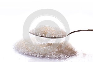 Granulated sugar in a spoon