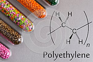 Granules of the POLYETHYLENE, chemical formula. Plastic pellets photo