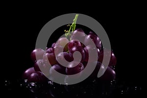 Grape on black background