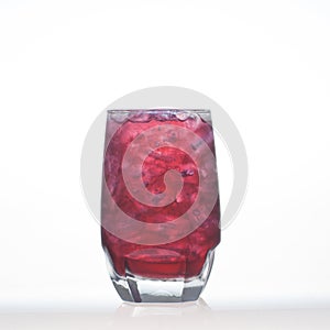 Grape flavour aerated drinks whit soda and ice in glass