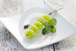 Grape fruit skewer with fresh mint