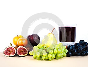 Grape juice with autumn seasonal fruits.