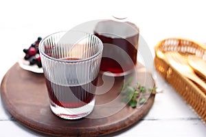 Grape juice poured into a stylish glass