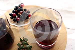 Grape juice poured into a stylish glass