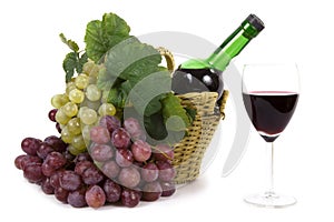 Grape with leaves and bottle of wine