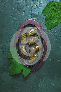 Grape leaves stuffed with meat and rice photo