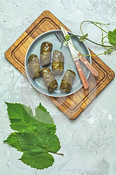 Grape leaves stuffed with meat and rice photo