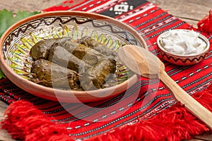 Grape leaves wrapped minced meat, or sarmale in romanian, traditional food with otoman roots