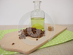 Grape seed oil, oil from grapeseeds in a bottle