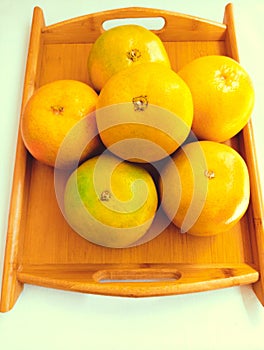 Grapefruit citrus fruit juicy fresh citrusfruit raw whole nutritious and health beneficial food closeup view image photo