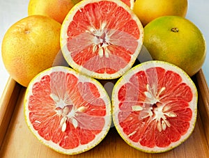 Grapefruit citrus fruit juicy fresh citrusfruit raw whole nutritious and health beneficial food closeup view image photo