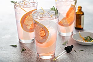 Grapefruit cocktail with rosemary with bitters photo