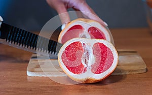 Grapefruit on a cutting board