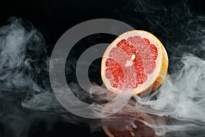Grapefruit in fragrant smoke