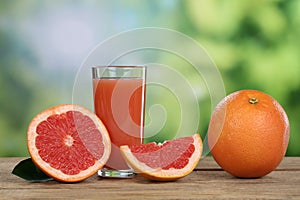 Grapefruit juice and fresh grapefruits in summer