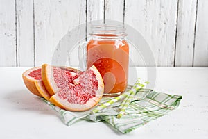 Grapefruit juice in a jar