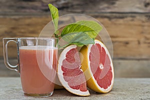 Grapefruit juice and pieces of fruit