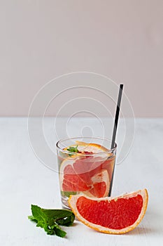 Grapefruit juice.Refreshing summer drinks on the white table