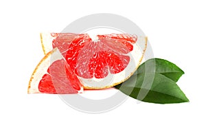 Grapefruit piece isolated on white background. Fresh fruit. With clipping path. Fresh grapefruit with green leaves