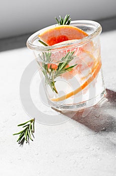 Grapefruit Rosemary Drink on Bright Background, Refreshing Cocktail