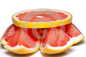 Grapefruit slices isolated on the white background