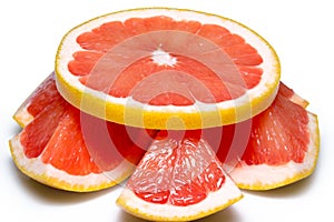 Grapefruit slices isolated on the white background photo