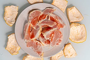 Grapefruit slices on a plate