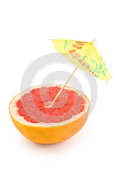 Grapefruit and umbrella