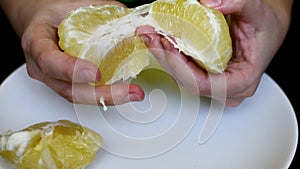 Grapefruit on a white background cleanses the skin for a meal