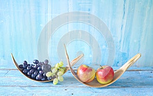 Grapes and apples on rustic table, dieting, healthy nutrition, fitness, copy space