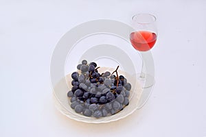 The grapes with a glass of wine