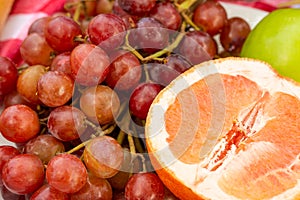 Grapes and grapefruit close-up macro