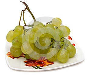 Grapes on a plate. isolated on white background