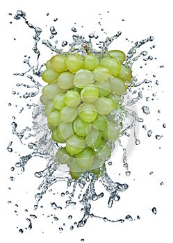 Grapes splashing in water