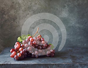 Grapes still life on dark grunge background