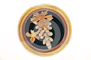 Grapes from the tree. Handmade. Wooden grapes in a frame on a white background