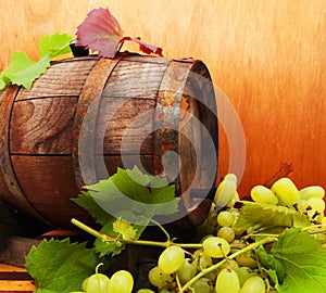 Grapes and a wine barrel